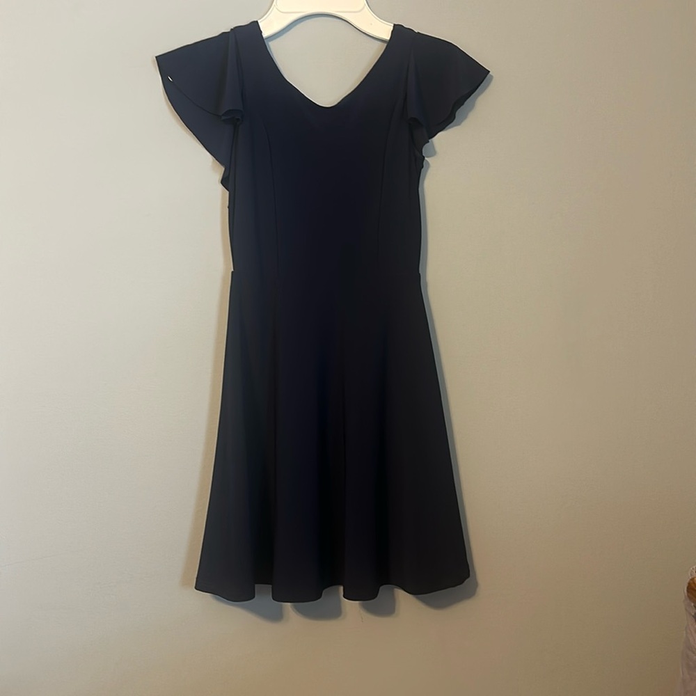 Elegant blue dress with frills on the back